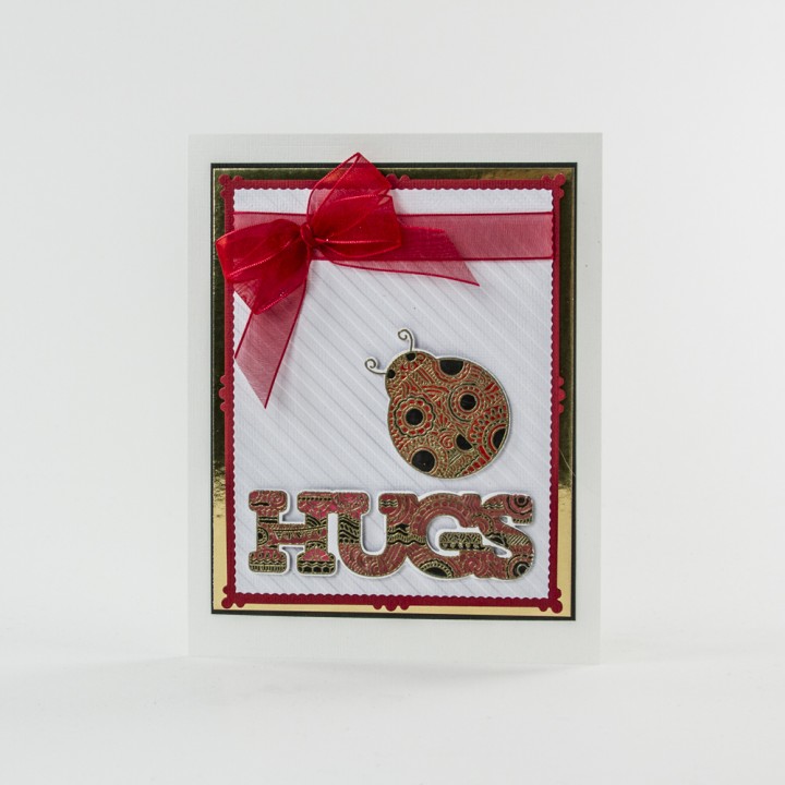 (1548E)Tonic Studios mandala moments - ladybird stamp & die set